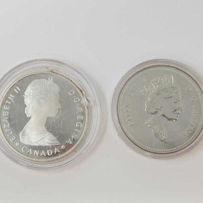 #2566 â€¢ (2) 50% Silver Canadian $1 Dollar Coins
