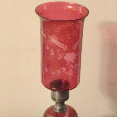 Sterling weighted candlestick with red cut glass shade