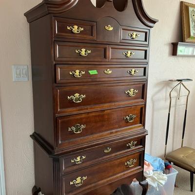 Chippendale style cherry highboy dresser with batwing brass hardware, matches long dresser