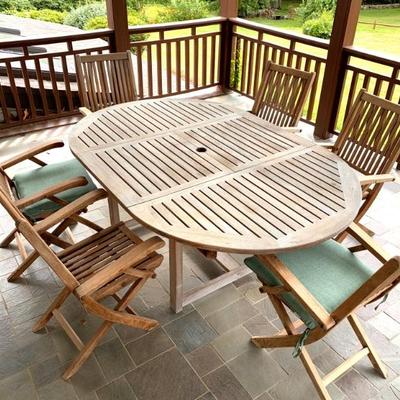 Rock Wood 7 pc. teak dining set. Also available are a Pr. of teak chaise lounges and side tables