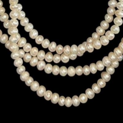 One of Ann's many gorgeous pearl necklaces up for sale.