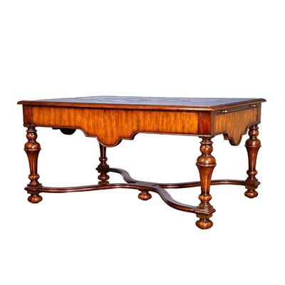 THEODORE ALEXANDER WILLIAM & MARY STYLE LOW TABLE | Carved top with leather inlay and intricate gilt border on the inlay, spindle legs...