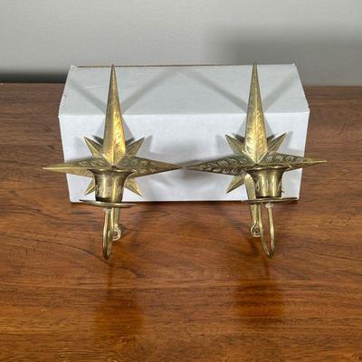 (2PC) PAIR BRASS STAR SCONCES | Brass candle sconces in shape of Star with leaf engravings. - l. 5.5 x w. 3 x h. 6.75 in 