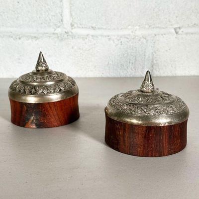 (2PC) PAIR TURNED WOOD BOWLS WITH HAMMERED METAL LIDS | turned figured wood bowls with decorative hammered white metal tops. - h. 4.5 x...