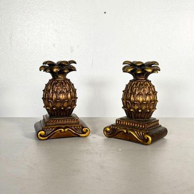 (2PC) PAIR PINEAPPLE BOOKENDS | Bronzed composition painted pineapple bookends. - l. 4.5 x w. 3.25 x h. 7 in 