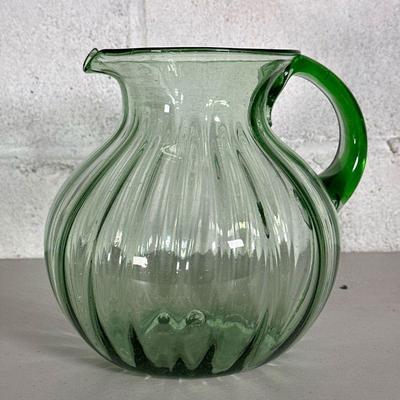 HAND BLOWN GREEN GLASS PITCHER | Light green glass pitcher, hand blown in Mexico. - h. 8.5 x dia. 8 in 