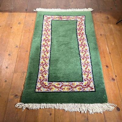 Small Green Moroccan Rug | Vintage green Moroccan rug with looping red and yellow pattern. 