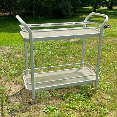 Patio Bar/Food Cart | White enameled with two-tier glass shelves and six round holders for liquor bottles. On casters. - l. 44 x w. 19 x...