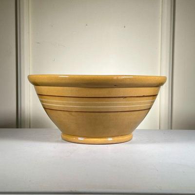 (3pc) Yellow Ware Bowl Lot | Lot includes: one large Yellowware bowl with great color and banding; one bowl marked â€œGreens Made in...