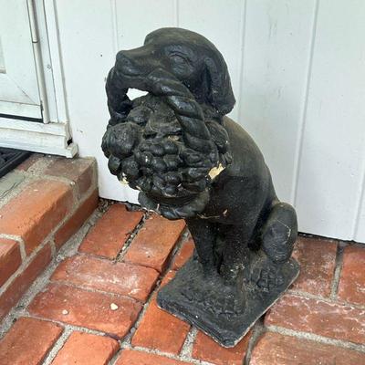 Dog Lawn Ornament | Labrador statue welcoming visitors with a basket of fruit; stone or cement painted black. - h. 23 in 