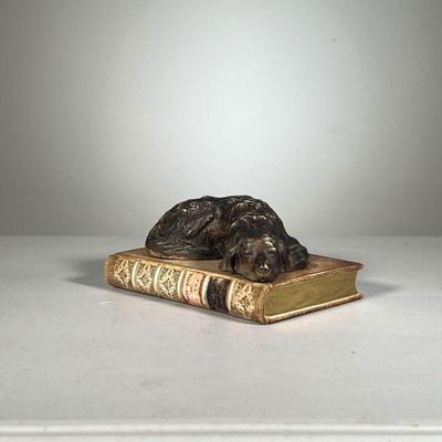 Dog On A Book | Desk ornament of a hunting dog curled up and sleeping on a vintage book. - l. 7 x w. 5 x h. 3.5 in 