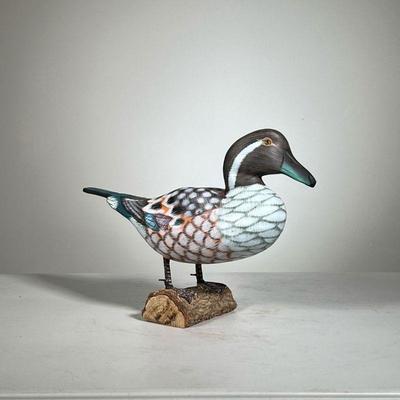Painted Wood Duck | Polychrome wood duck mounted to a small log; glass eyes intact; no apparent signature. - l. 13 x h. 9 in 