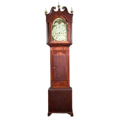English Longcase Clock | Scroll top with pressed brass rosettes and three brass finials, the face with Roman numerals markers, painted...