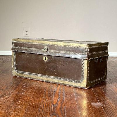 Vintage Storage Trunk | Leather wrapped wood trunk with hinged lid, having brass tacks and hardware . - l. 12.5 x w. 24.5 x h. 11 in 