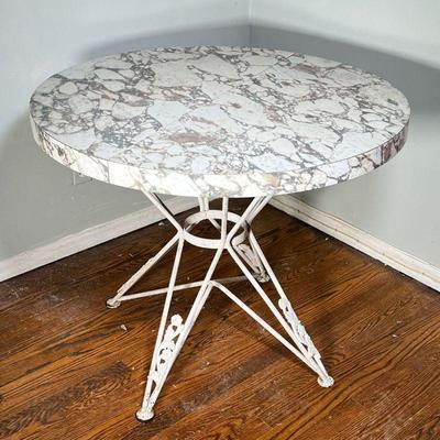 Mid-Century Style Table | Patterned composite top on a quadruped wrought iron base with scrolling floral legs. - h. 30 x dia. 36 in 
