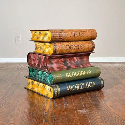 Book Side Table | 20th century painted tin storage box / side table in the form of vintage books; top book cover can be opened to reveal...