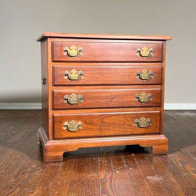 Diminutive Side Cabinet | Virginia Galleries chest of drawers, with side handles and four full width drawers. - l. 24 x w. 16 x h. 23 in 