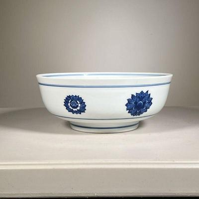 Tiffany & Co. Lotus Bowl | Large Tiffany and Co. blue and white porcelain bowl with lotus motifs; marked on bottom. - h. 5 x dia. 12 in 