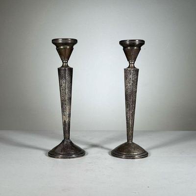Pair Sterling Candlesticks | A pair of sterling cement-filled candlestick, numbered 