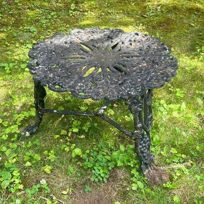 Wrought Iron Table | Wrought iron garden / patio side table in black with grapevine motifs composing the tabletop and three legs. - h. 14...