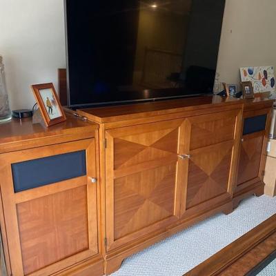 The only thing for sale in this picture is the cabinetsâ€¦ picture is to show the cabinet.. TV lowers into cabinet..