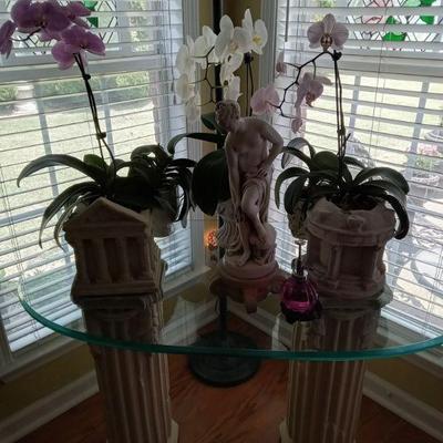 Glass top table with columns
