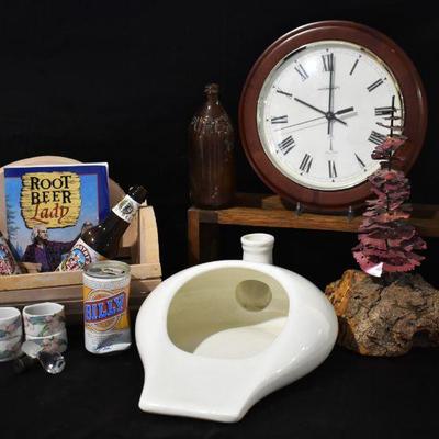 porcelain bed pan, clock, metal and wood tree sculpture