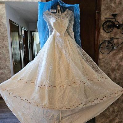 Vintage wedding dress with train.  
Very well preserved.  Don't mid this one!