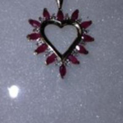 10KT GOLD RUBY AND DIAMOND CHIP (?) NECKLACE