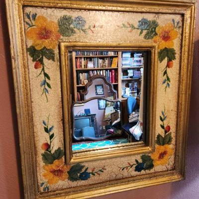 Unusual mirror with hand painted frame.