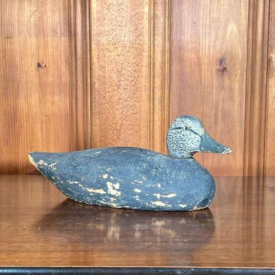 HAND CARVED WOODEN DUCK DECOY | Hand carved and painted wood duck decoy with rotating head. - l. 16.5 x w. 6 x h. 6.5 in 