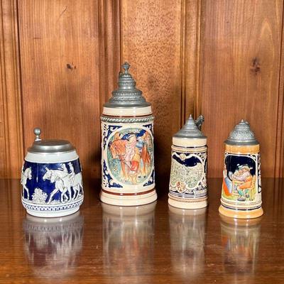 (4PC) BEER STEINS & OTHER | Includes large colorful stein with German writing and town crier on horse, 2 smaller steins with German...