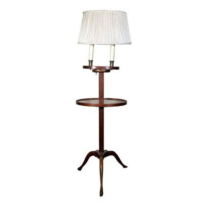 WOOD FLOOR LAMP WITH SHELF | Carved wood floor lamp with oval shelf and 2 bulbs. Shelf height 24.75in. - l. 15.5 x w. 11.5 x h. 49 in 