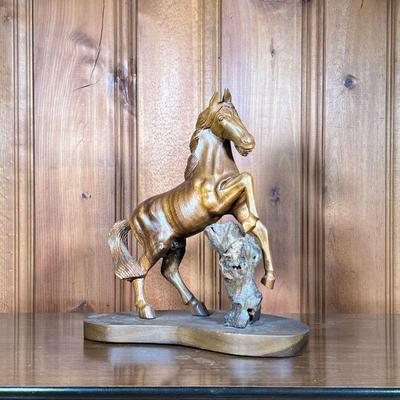 CARVED WOOD HORSE STATUE | Carved horse statue with natural wood support. - l. 16 x w. 8 x h. 17.5 in 