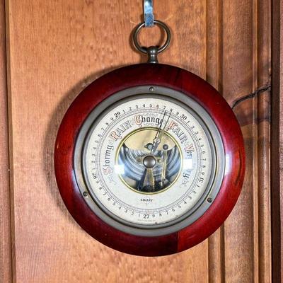 SWIFT BAROMETER | Swift barometer in round wood frame with ring on top for hanging. - dia. 5 in 