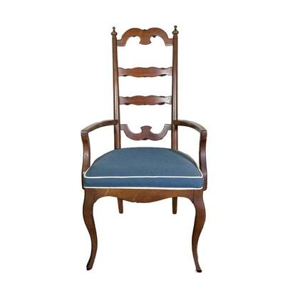 CURVED WOODEN ARMCHAIR | Curved ladder back armchair with blue cushion with white border. - l. 22.75 x w. 20 x h. 44.5 in 