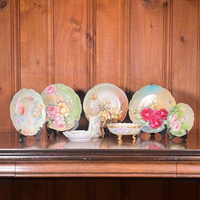 (8PC) MIXED LIMOGES DISHES | Includes; 4 Limoges France floral plates, mixed sizes, Limoges creamer, and 3 Limoges style floral bowls. -...