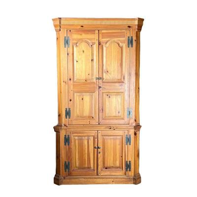 KNOTTED PINE CORNER CABINET | Corner cabinet/bookcase with 3 carved shelves and 2-door storage on bottom. - l. 46 x w. 20 x h. 86 in 