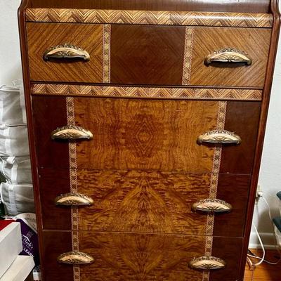 Chest of drawers matches the bed, vanity
