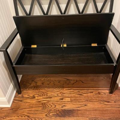 This stylish wooden bench has an unexpected feature: Storage beneath the seat. 44.5" W x 19.5" D x 39.5"H