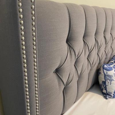 King Size Headboard, tufted with nailheads. This bed features elegant styling. The formidable headboard with the button tufting and nail...