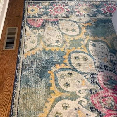 Floral Kiyoko Area Rug. This floral pattern pops with its bright beautiful color palette. This rug is sure to make a statement in any...