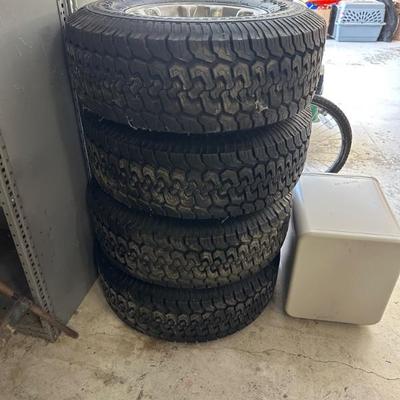 set (4) of all terrain pathfinder tires 31 x 10:50R 15 LT 1090 mounted on mag wheels