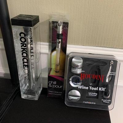 Corkcicle One. Wine Chiller
,The Shaper Image. Chill and Pour,  
Wine Tool Kit