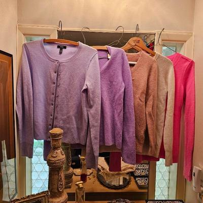 Numerous cashmere sweaters.