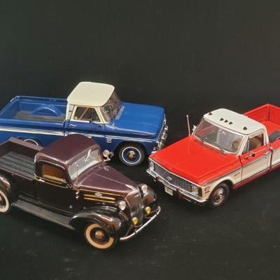 Lot 041-MT: A Trio of Die-cast Chevy Pickups

Features:
â€¢	Danbury Mint Diecast 1937 Chevrolet Pickup
â€¢	Danbury Mint Diecast 1966...