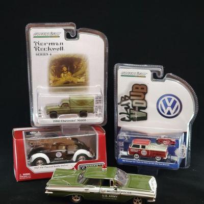 Lot 031-MT: Die-cast Volks and Chevys

Features:
â€¢	Diecast 1959 U.S. Army Military Police Chevrolet Impala, no. 35920
â€¢	Diecast 1967...