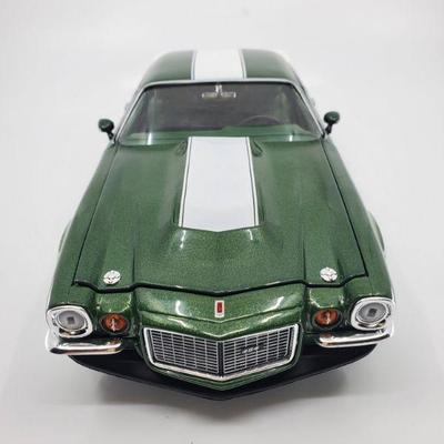 Lot 006-MT: Die-cast 1970 Chevy Camaro

Features:
â€¢	#0674


Manufacturer: ERTL
Mfg. Year: 2016
Scale: N/A
Country of Origin: China...