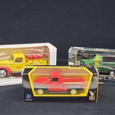 Lot 013-MT: Die-cast Pickup Trio #1

Features:
â€¢	1 â€“ Lucky Diecast 1950 GMC Pick Up
â€¢	1 â€“ Motor Max Diecast 1941 Plymouth Pickup...