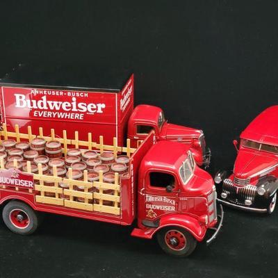 Lot 046-MT: Budweiser Die-cast Delivery Truck Trio #1

Features:
â€¢	Diecast 1937 Chevrolet Anheuser-Busch Budweiser Delivery Truck with...